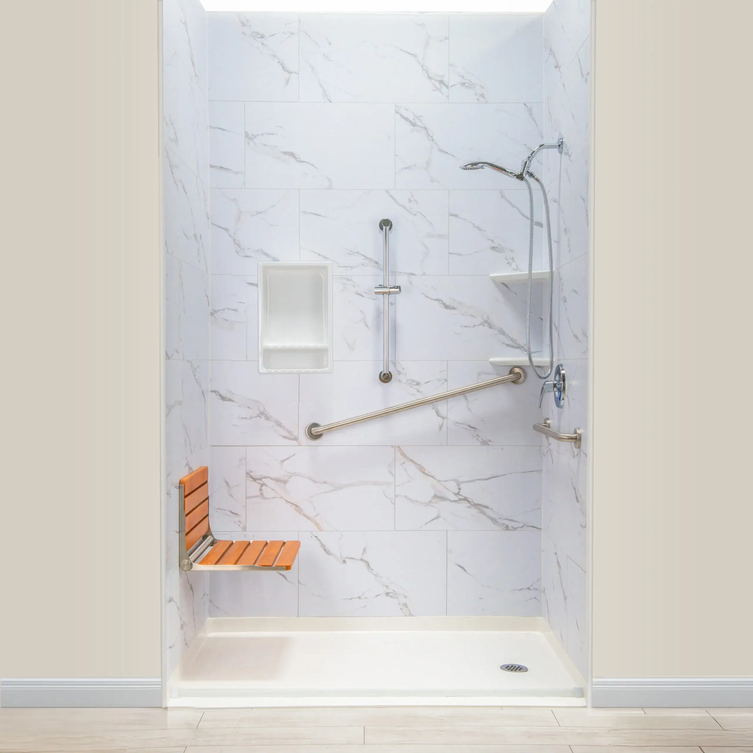 Curbless, low-threshold shower entry with a grab bar
